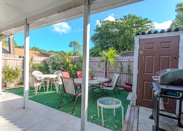 view of patio with a grill