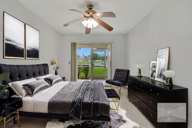 bedroom with ceiling fan and light hardwood / wood-style flooring