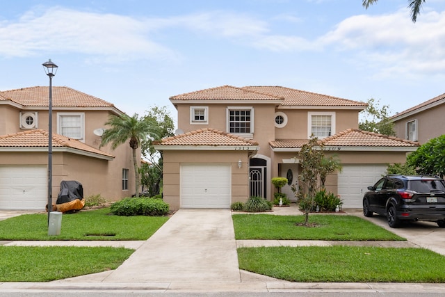 mediterranean / spanish-style house with a front yard and a garage