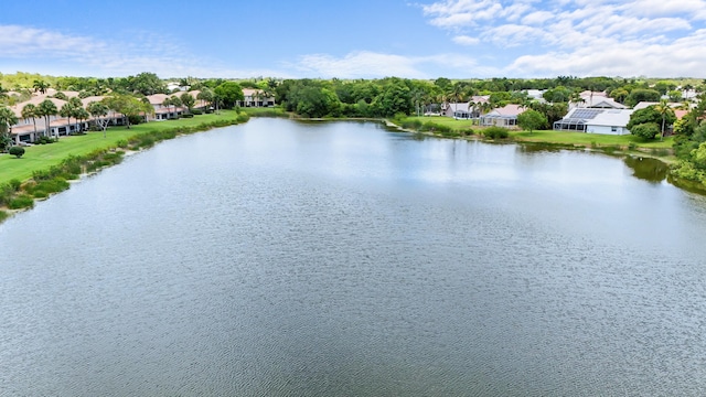 birds eye view of property featuring a water view