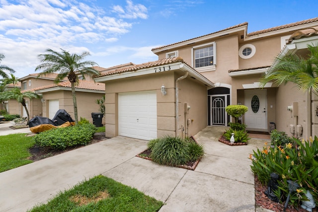 view of front of home featuring a garage