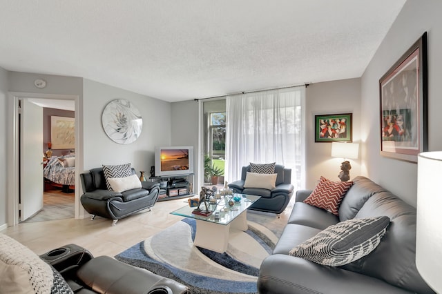 tiled living room with a textured ceiling