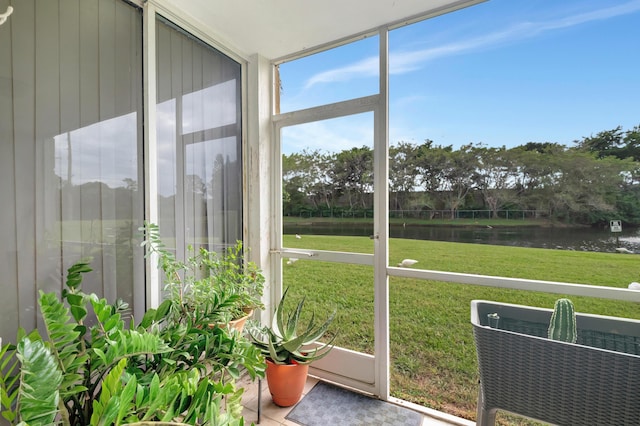 sunroom with a water view