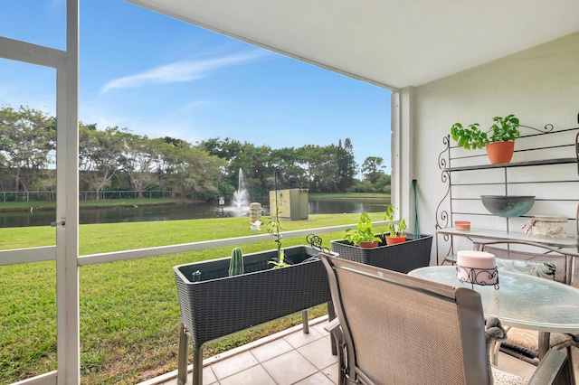 balcony featuring a water view