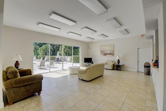 living room with light tile patterned floors