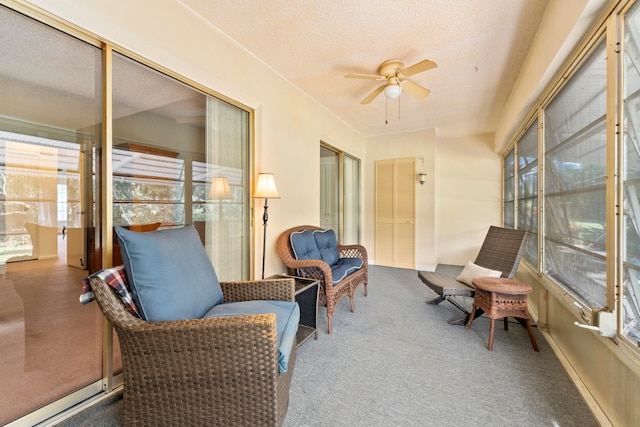 sunroom / solarium with ceiling fan