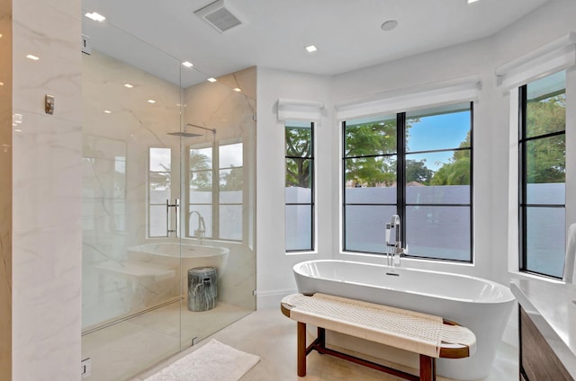 bathroom featuring plus walk in shower