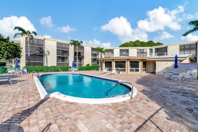 view of pool with a patio