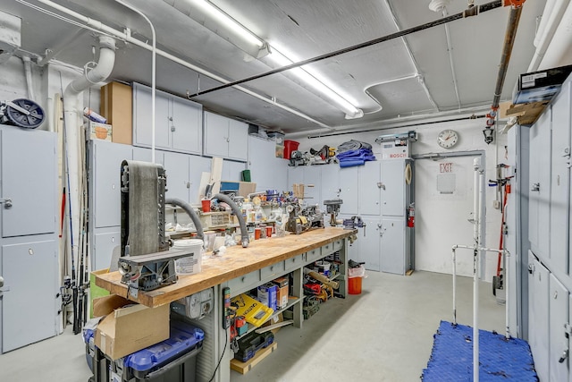 basement with a workshop area