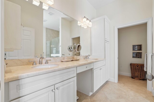 4 Country Rd, Village Of Golf, FL 33436 - bathroom with tile patterned flooring, vanity, and a shower with door