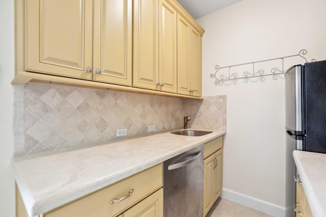 4 Country Rd, Village Of Golf, FL 33436 - kitchen featuring backsplash, sink, light tile patterned floors, and stainless steel appliances