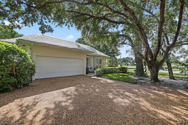 4 Country Rd, Village Of Golf, FL 33436 - ranch-style home with a garage