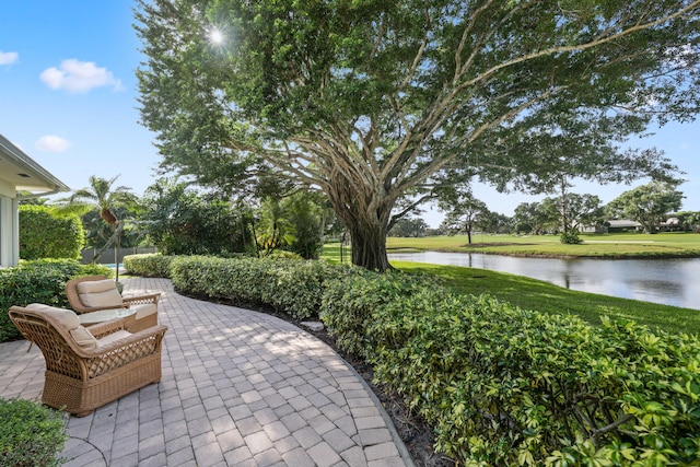 4 Country Rd, Village Of Golf, FL 33436 - view of patio / terrace with a water view