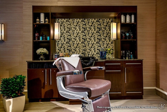 sitting room with light hardwood / wood-style floors and built in features