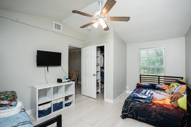 bedroom with lofted ceiling and ceiling fan