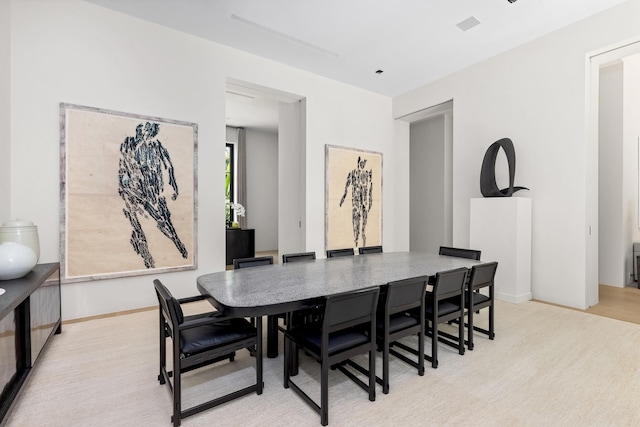 dining room featuring light wood-type flooring