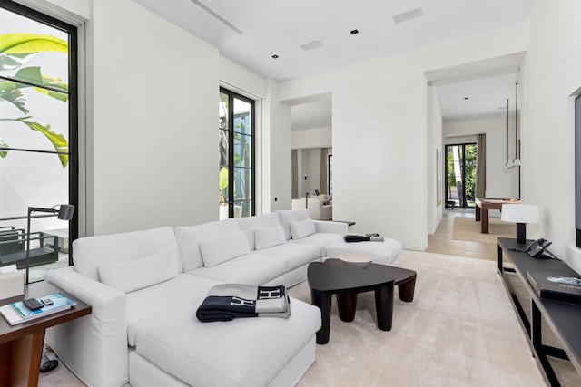 living room with light hardwood / wood-style flooring