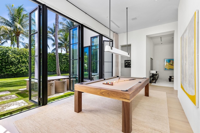 recreation room featuring billiards and light wood-type flooring