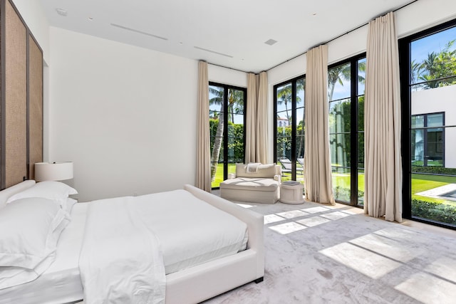 bedroom with light colored carpet