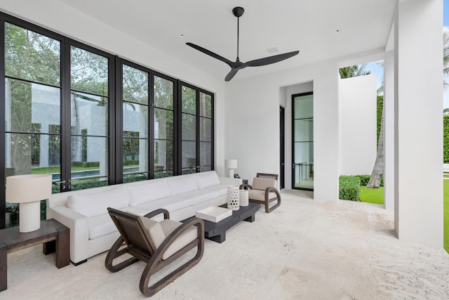 living room with ceiling fan