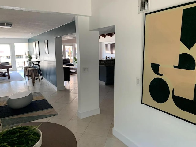 1740 SE 7th St, Fort Lauderdale, FL 33316 - hall featuring baseboards, a wealth of natural light, and light tile patterned floors