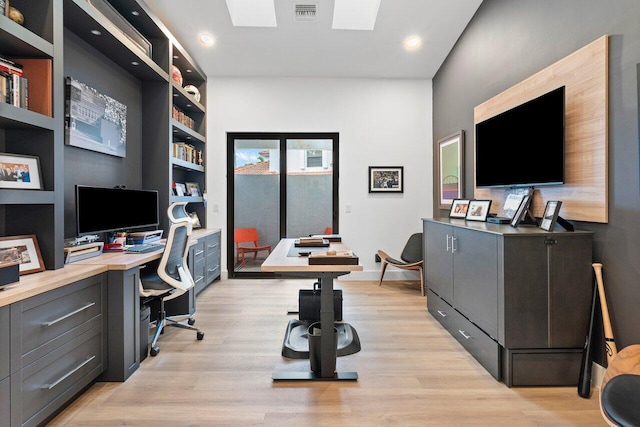 office space featuring light hardwood / wood-style floors