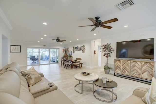 living room featuring light wood-type flooring and ceiling fan