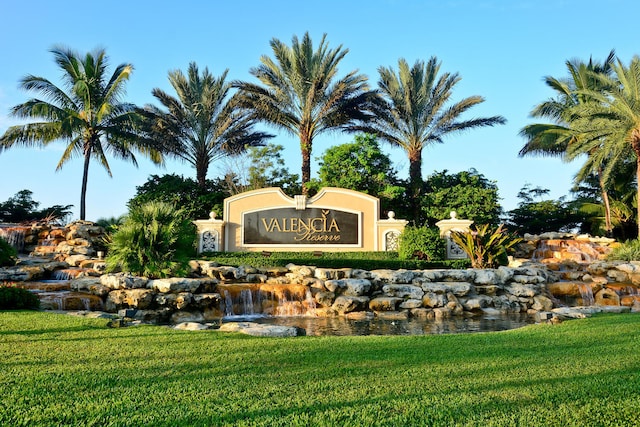 community sign with a lawn