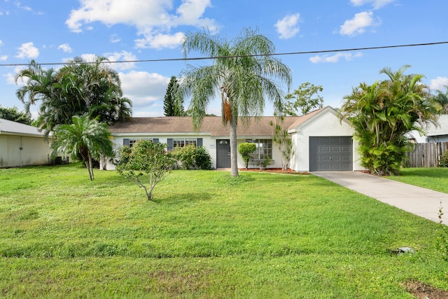 ranch-style house with a front yard and a garage