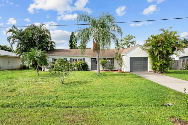 2222 SE Carnation Rd, Port Saint Lucie, FL 34952 - ranch-style home featuring an attached garage, concrete driveway, and stucco siding