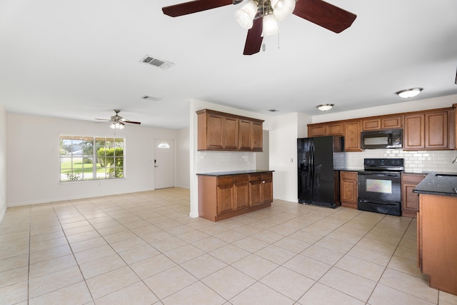 kitchen with backsplash, black appliances, light tile patterned floors, and ceiling fan