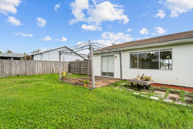 back of house featuring a lawn