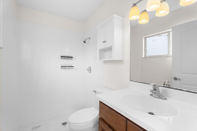 2222 SE Carnation Rd, Port Saint Lucie, FL 34952 - bathroom featuring vanity, toilet, and a tile shower