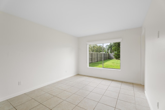 view of tiled spare room