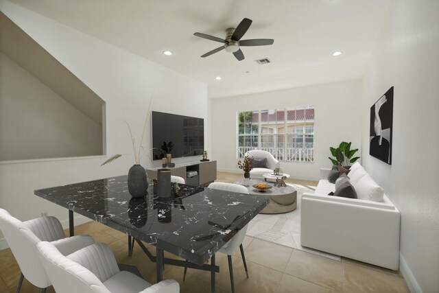 tiled spare room featuring ceiling fan