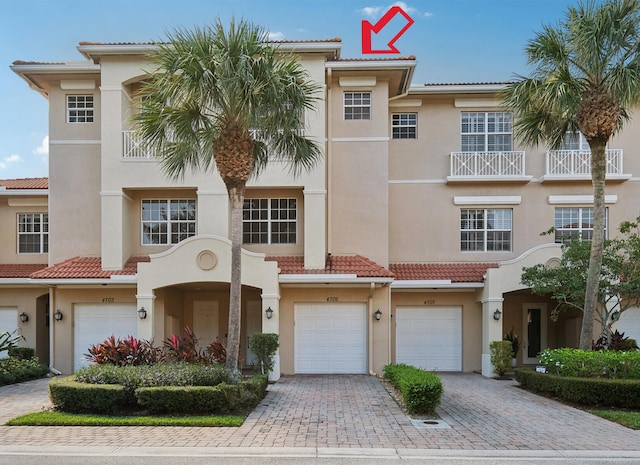 view of front of property with a garage