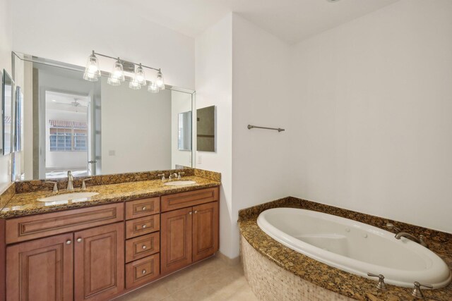 carpeted bedroom featuring ceiling fan, a tray ceiling, and ornamental molding