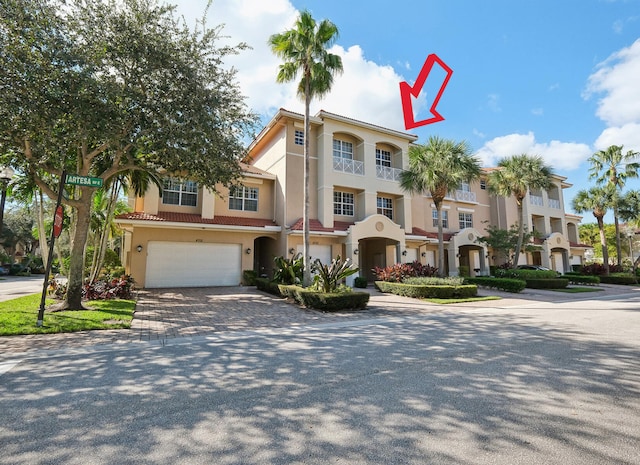 view of front of home featuring a garage