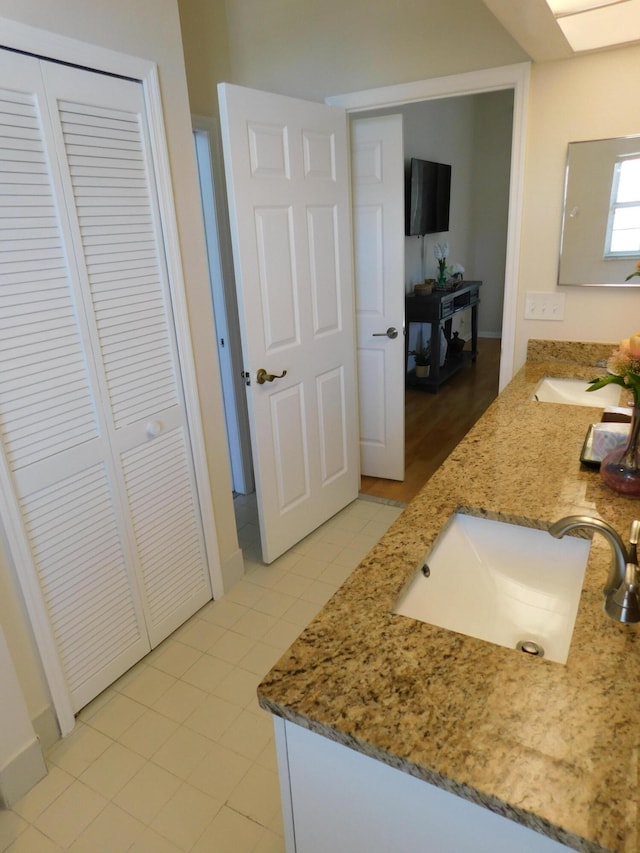 bathroom featuring vanity and tile patterned flooring