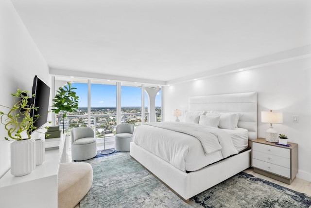 bedroom featuring light hardwood / wood-style floors