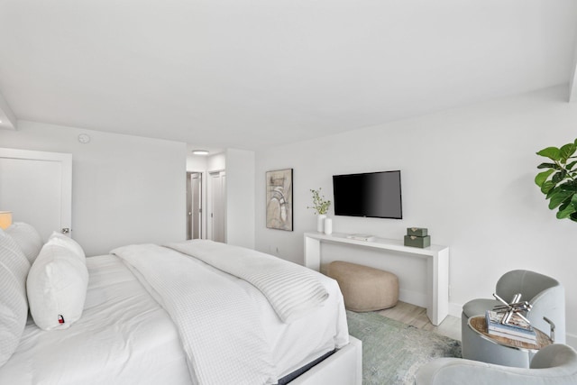 bedroom featuring light hardwood / wood-style floors