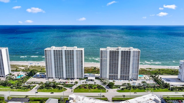 aerial view with a beach view and a water view