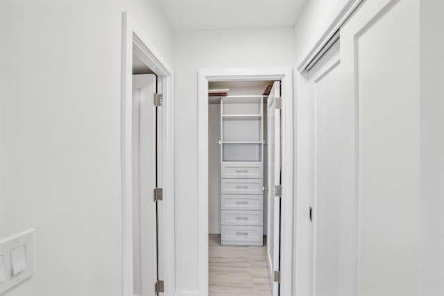 corridor featuring light wood-type flooring