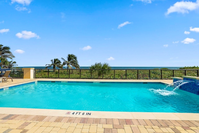 view of pool featuring pool water feature