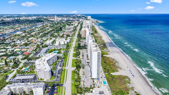 aerial view with a view of the beach and a water view