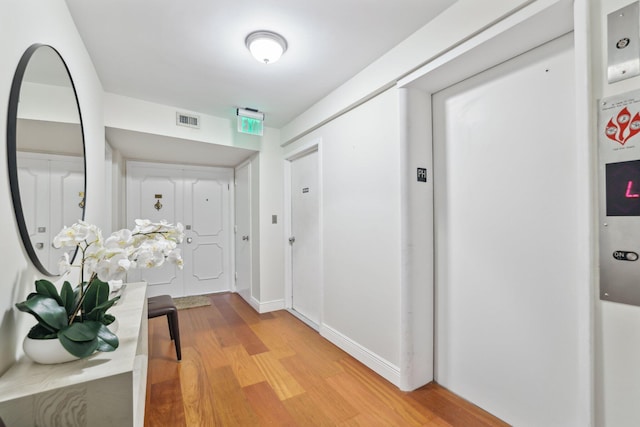 hall featuring hardwood / wood-style floors