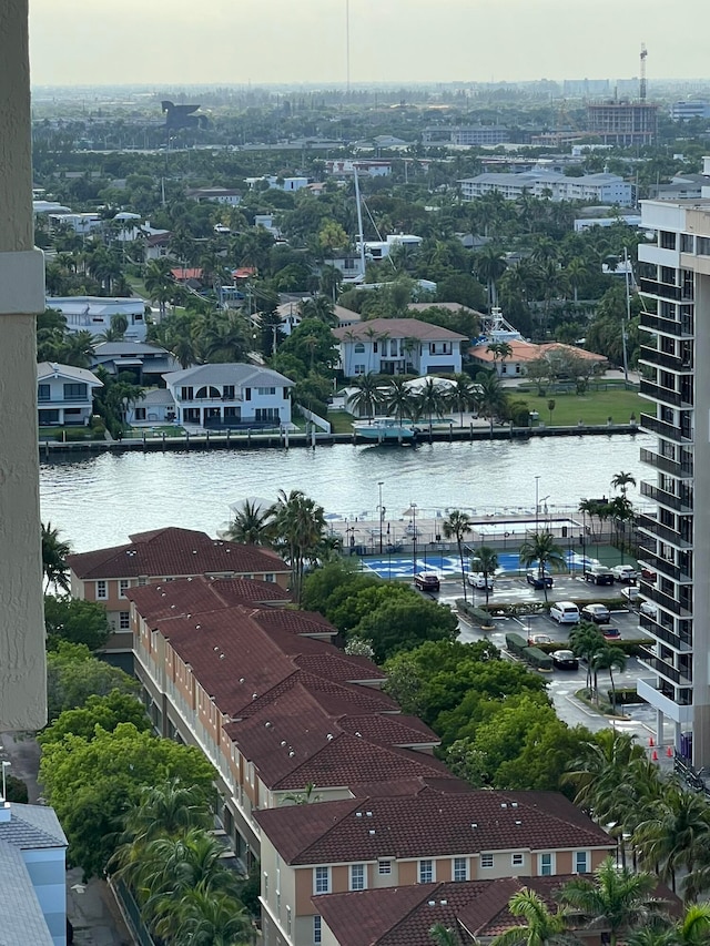 birds eye view of property featuring a water view