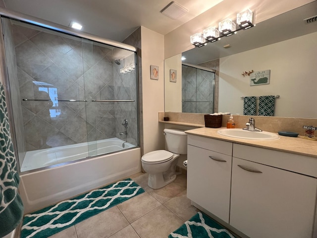 full bathroom featuring vanity, toilet, shower / bathtub combination with curtain, and tile patterned flooring