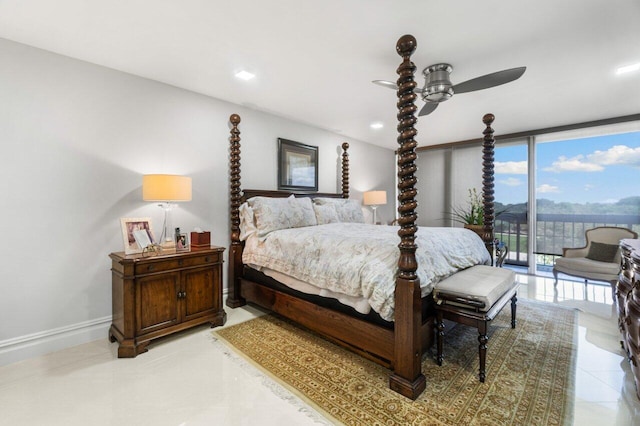 bedroom featuring a wall of windows, access to exterior, light tile patterned floors, and ceiling fan