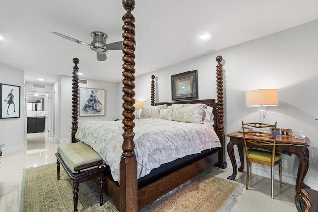 bedroom with ensuite bathroom and ceiling fan